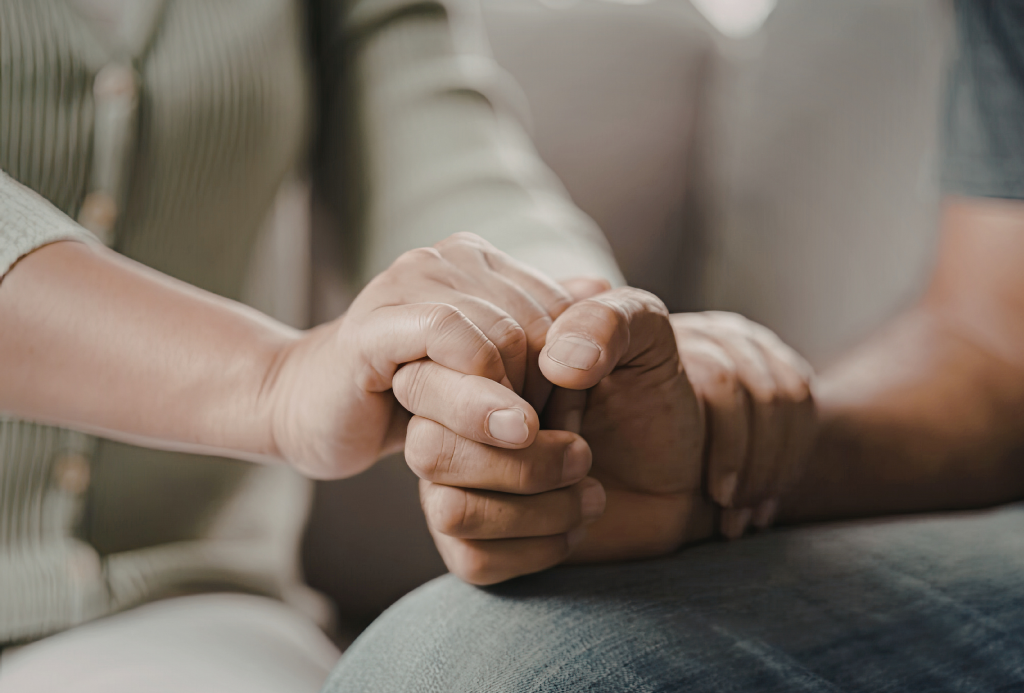 Partner offering calm support and reassurance to a loved one struggling with Relationship OCD (ROCD), illustrating healthy communication, patience, and understanding in OCD recovery and relationship anxiety support